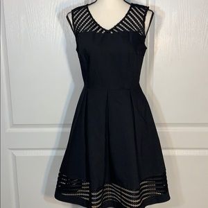 Charming Charlie’s sleeveless v neck black dress